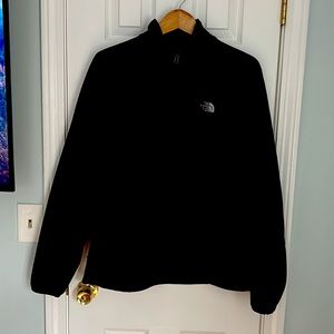 Black North Face soft jacket.